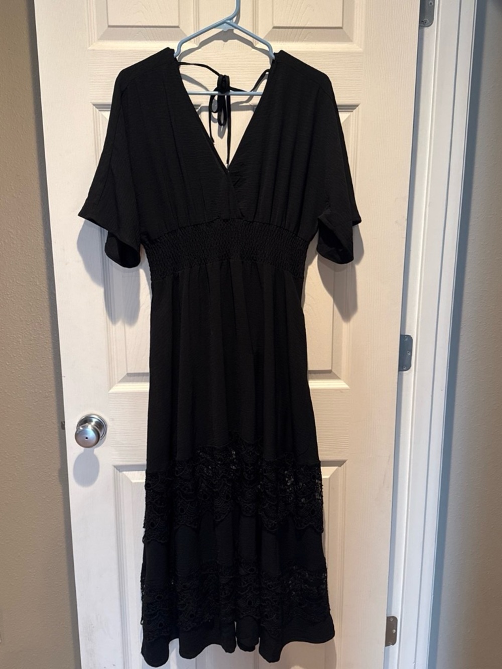 Elegant Black Midi Dress with Smocked Waist and V-Neck Tie